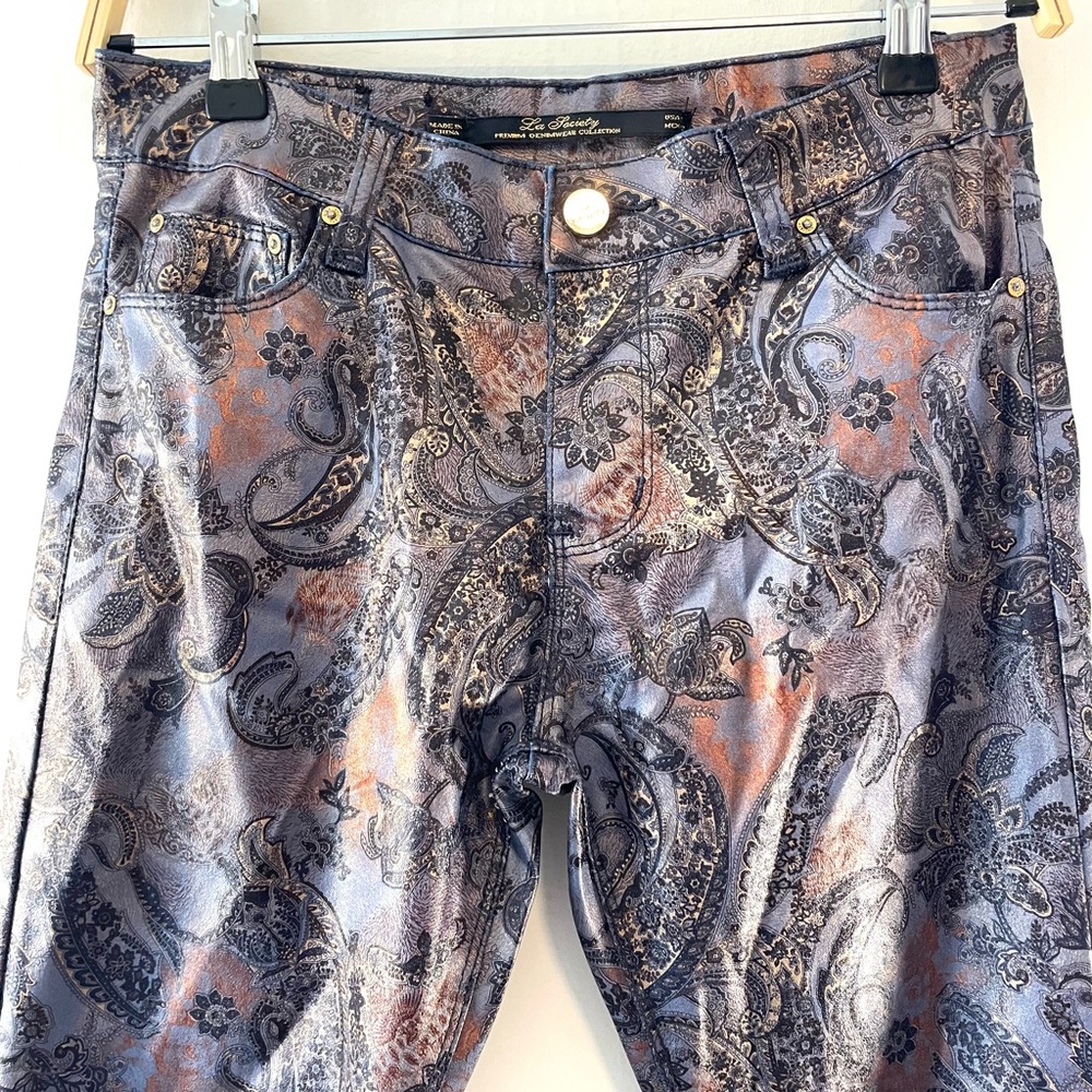 Coated paisley print pants.